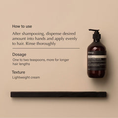 Aesop conditioner being applied to hair for even distribution and hydration.