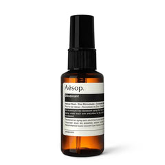 Aesop Deodorant Spray bottle with woody aroma delivering long-lasting freshness.