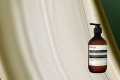 Aesop Geranium Leaf Body Balm texture close-up shows velvety smoothness