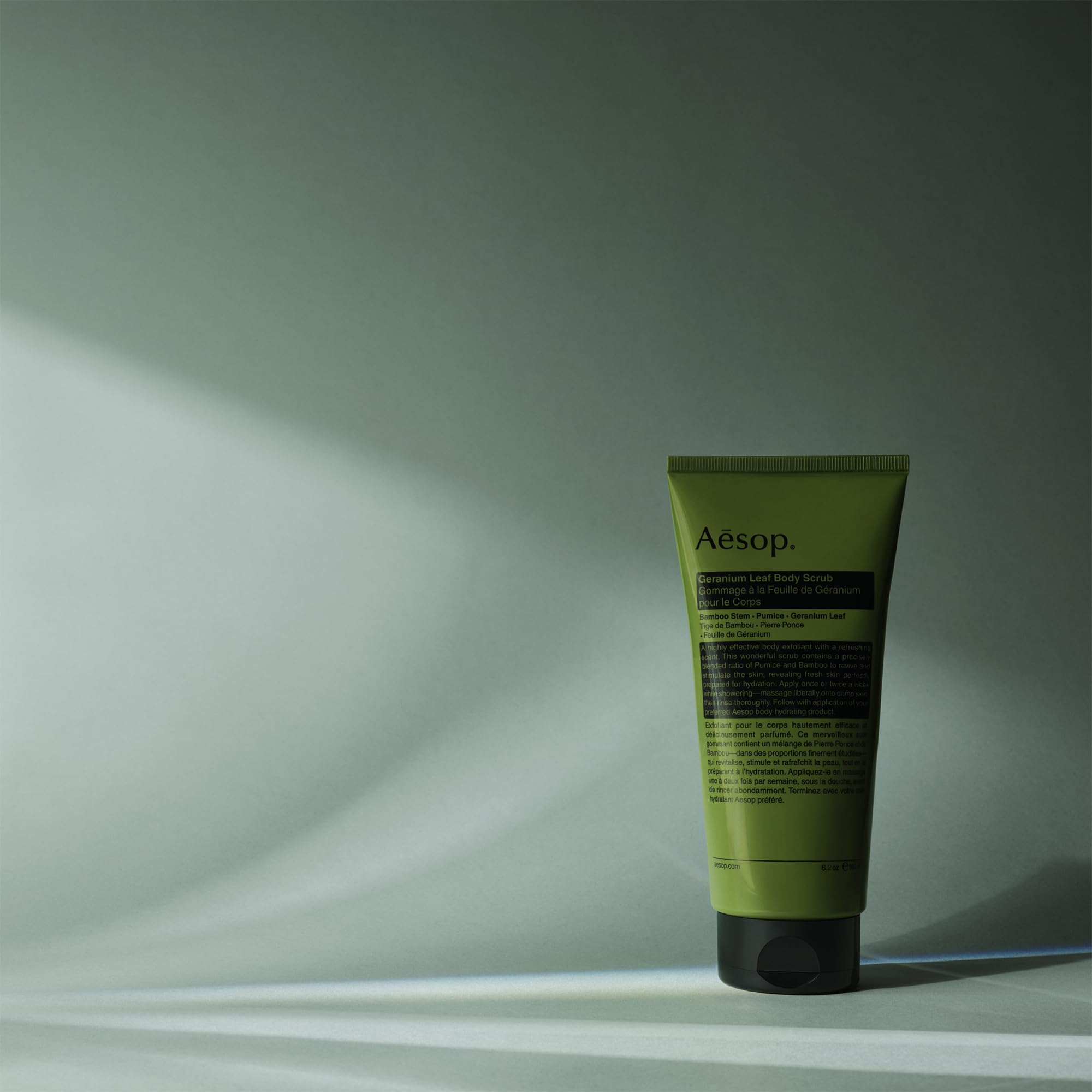 Aesop Geranium Leaf Exfoliating Body Scrub rinse-off action delivering clean, hydrated skin.