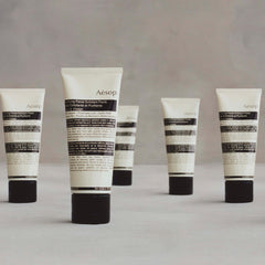 Aesop Purifying Facial Exfoliant Paste with rosemary leaf for aromatic cleansing.