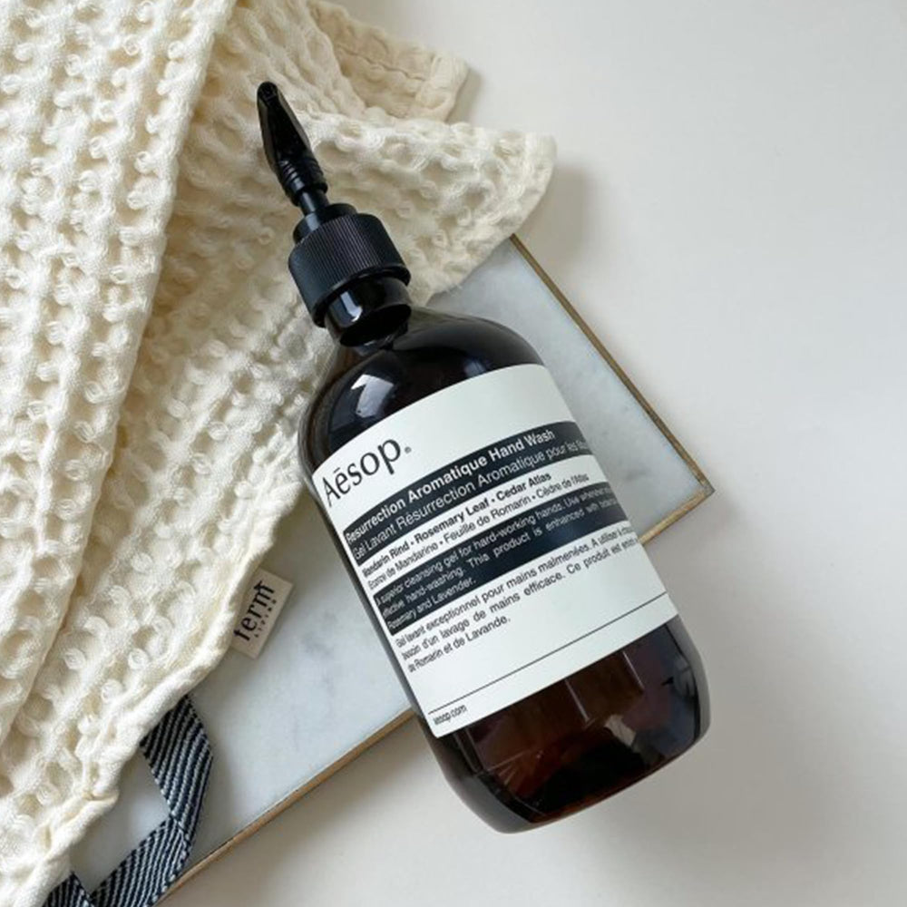 Aesop Resurrection Aromatique Hand Wash in bathroom setup ready for daily ritual.