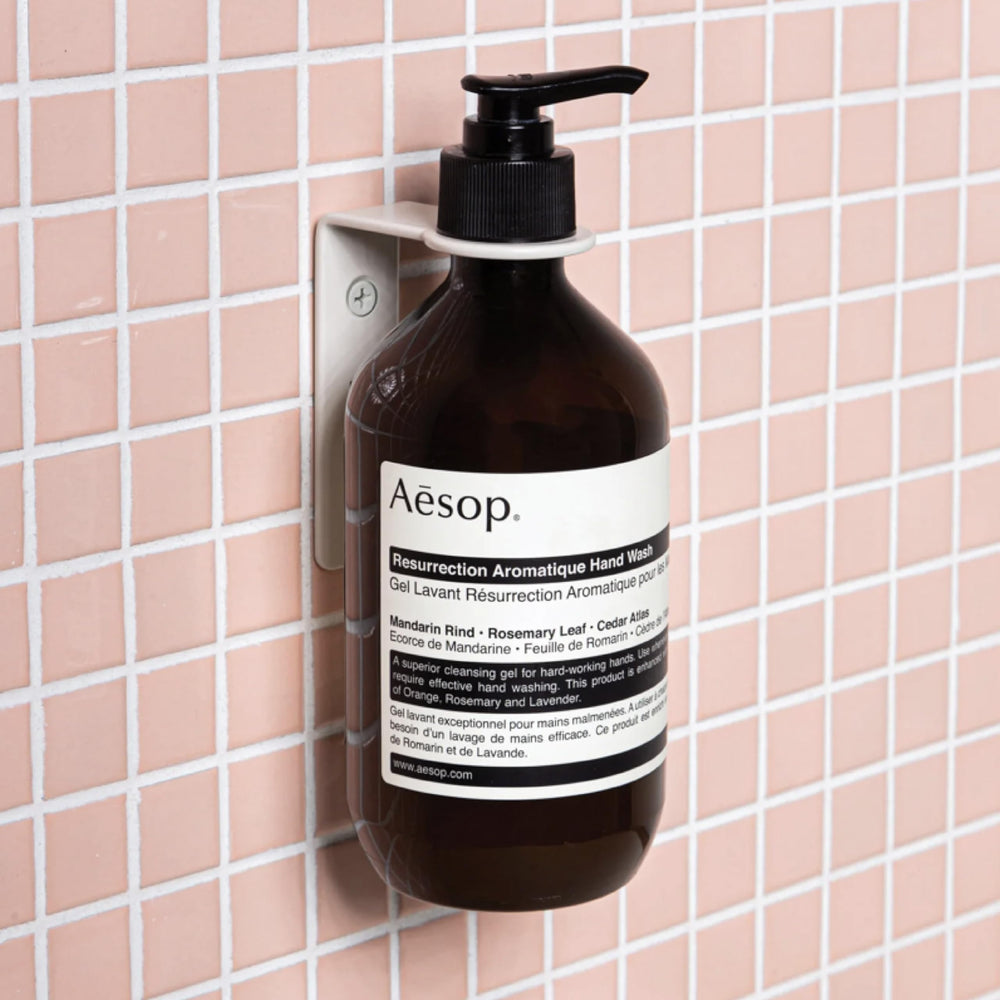 Aesop Resurrection Aromatique Hand Wash ingredients close-up features mandarin rind and rosemary for skin-friendly cleansing.