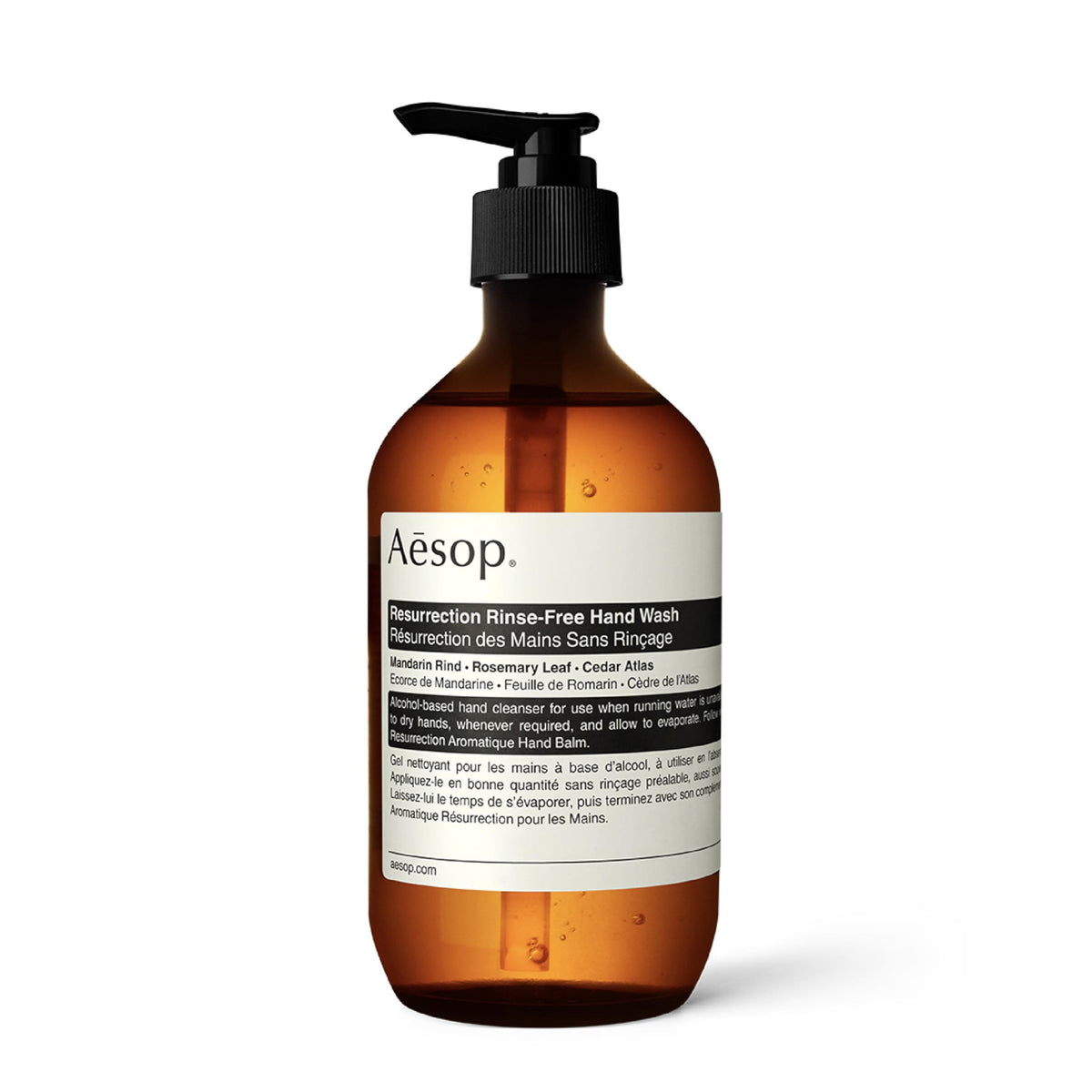 Aesop Resurrection Rinse-Free Hand Wash bottle on shelf for quick, waterless cleansing.