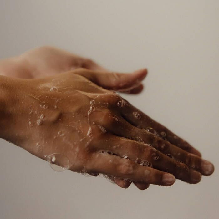 Aesop Reverence Aromatique Hand Wash pumice-detail highlights texture and subtle polishing.