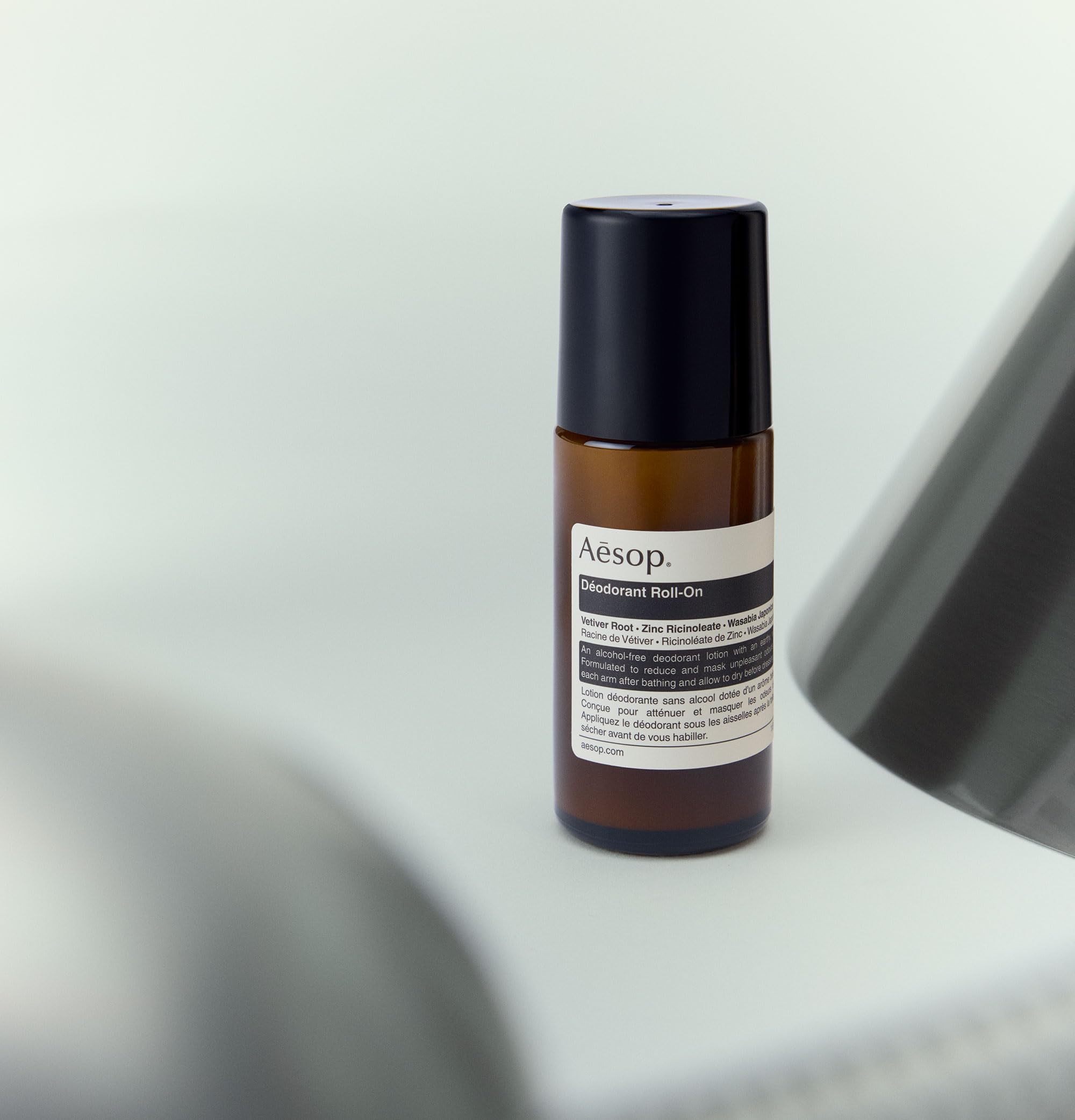 Aesop Roll On Deodorant packaging closeup highlights recycled-plastic bottle material