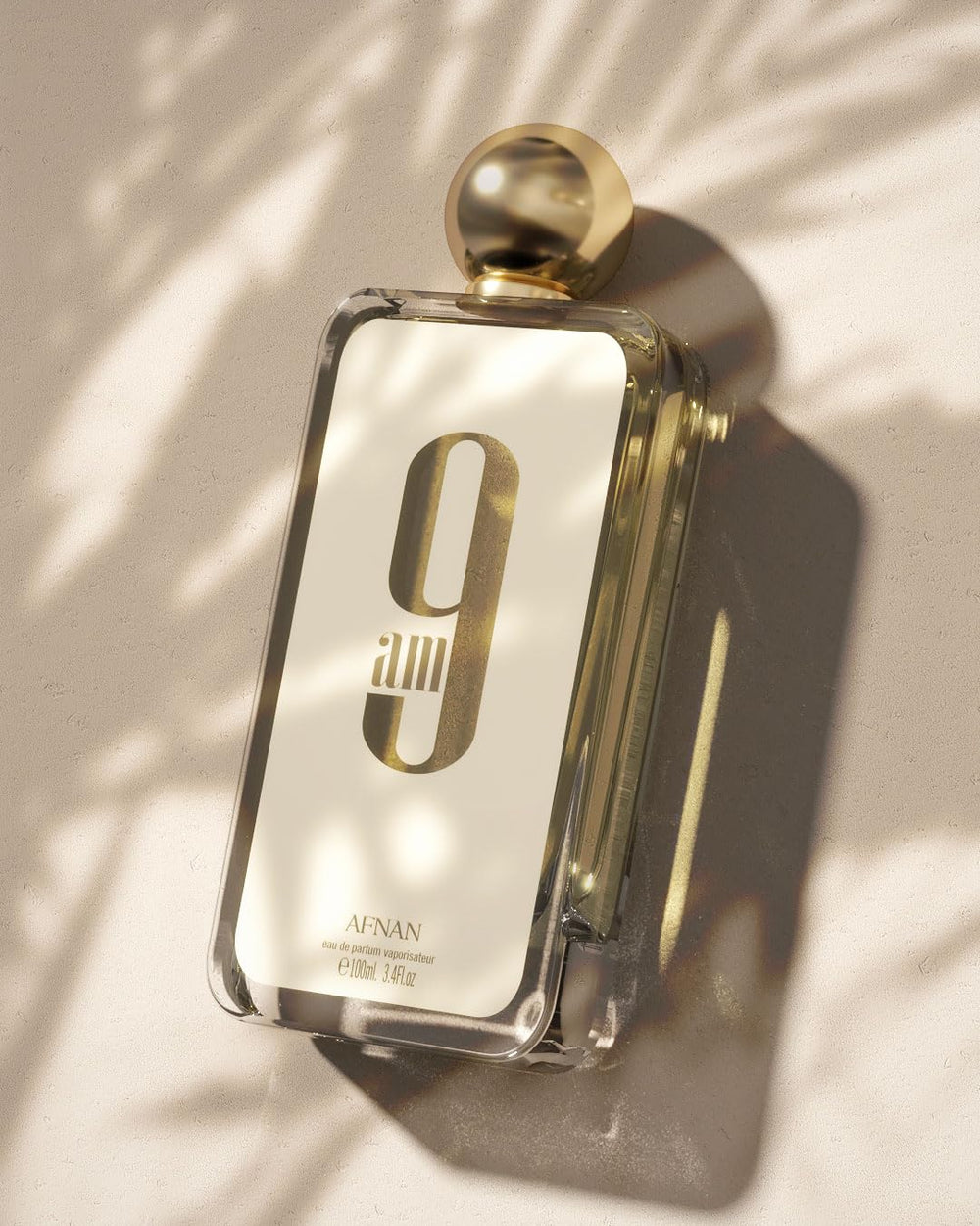 Afnan 9 AM moss-patchouli-musk base closeup suggests lasting, versatile fragrance trail.