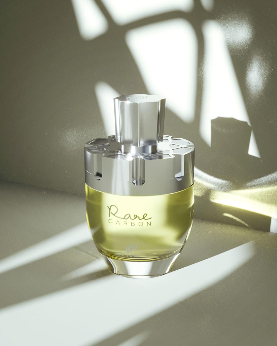 Afnan Rare Carbon heart notes rose and cedarwood suggest polished elegance.