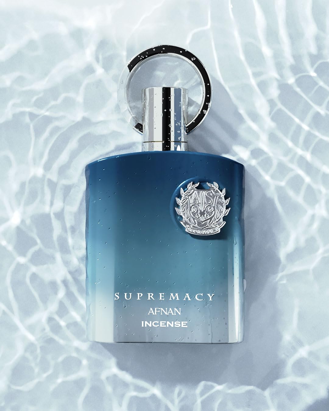 Afnan Supremacy Incense applying scene suggests all-day confidence for versatile occasions.