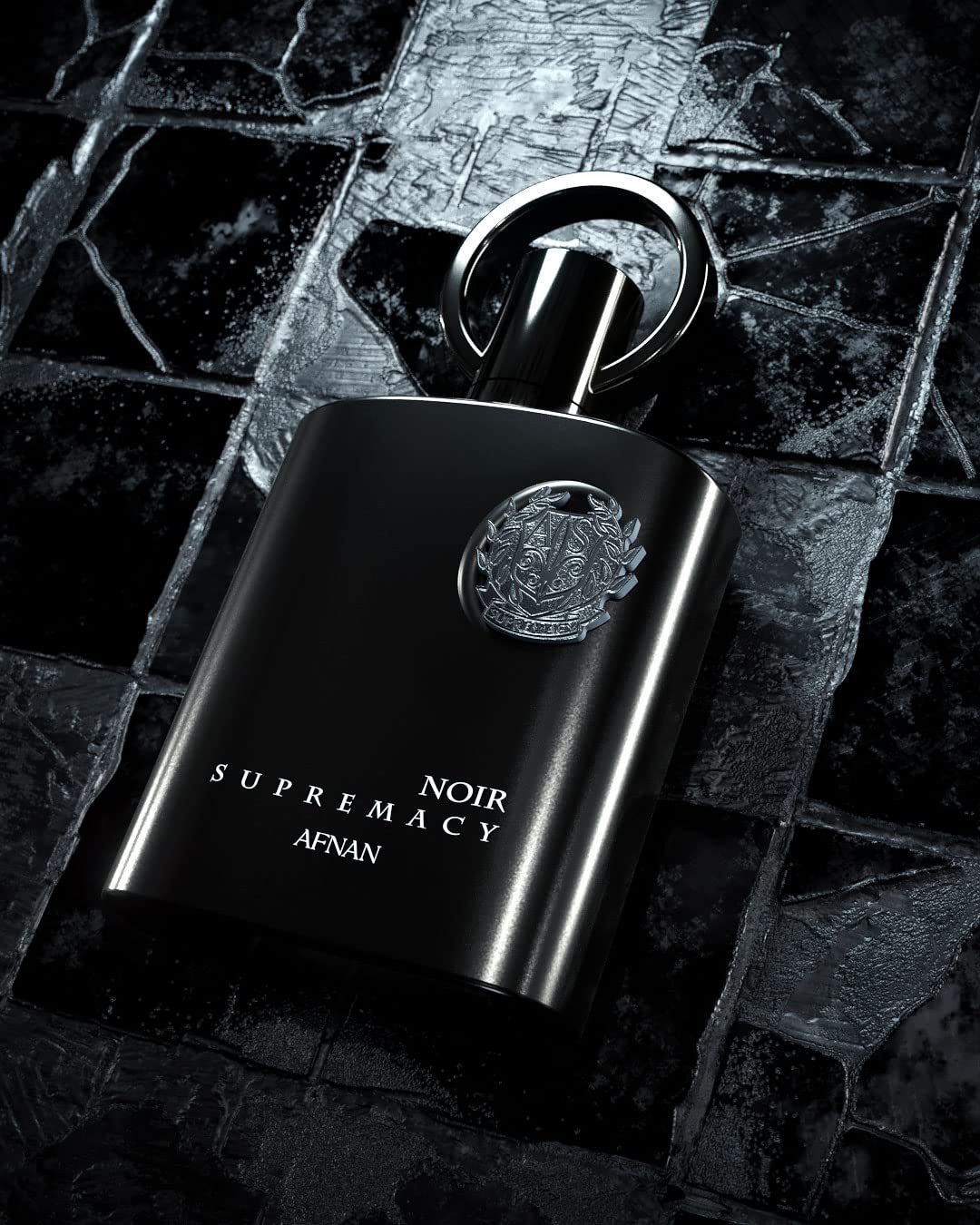 Afnan Supremacy Noir warm amber base evokes lasting warmth.
