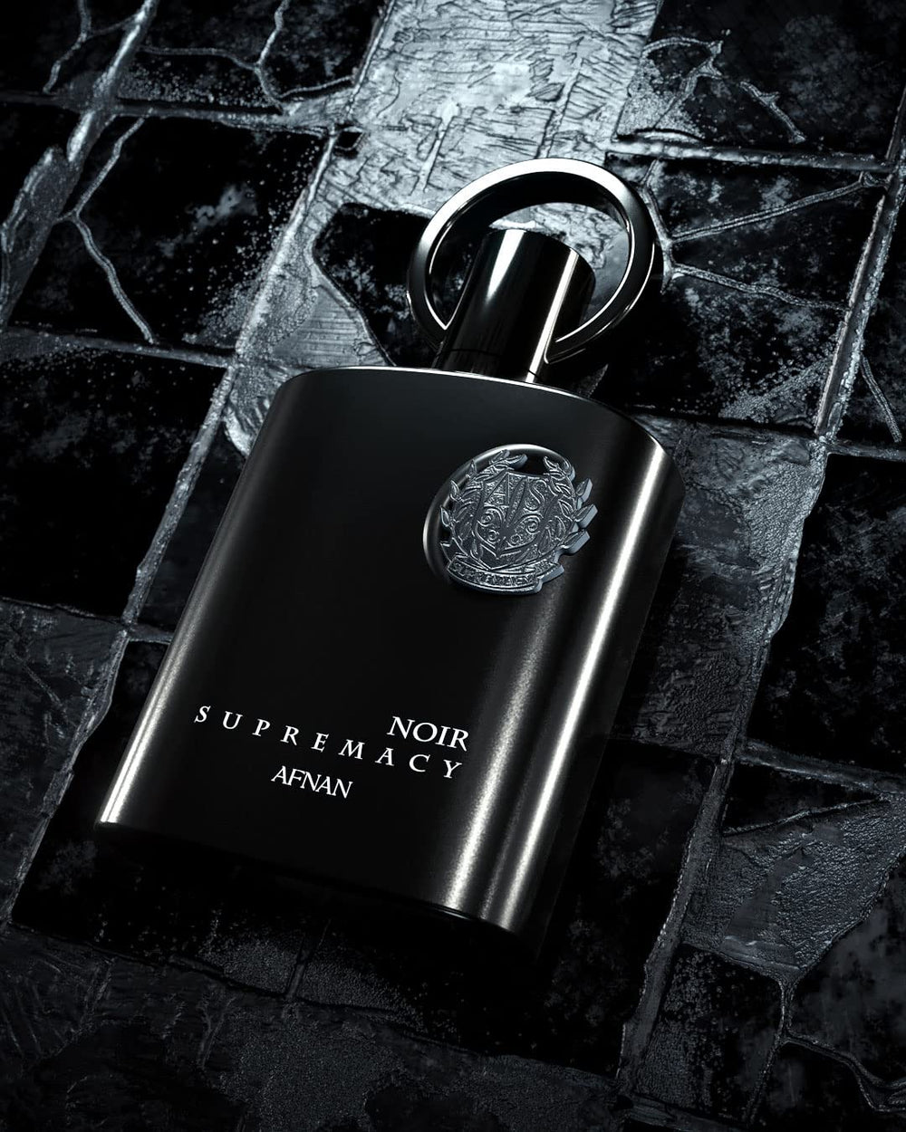Afnan Supremacy Noir warm amber base evokes lasting warmth.