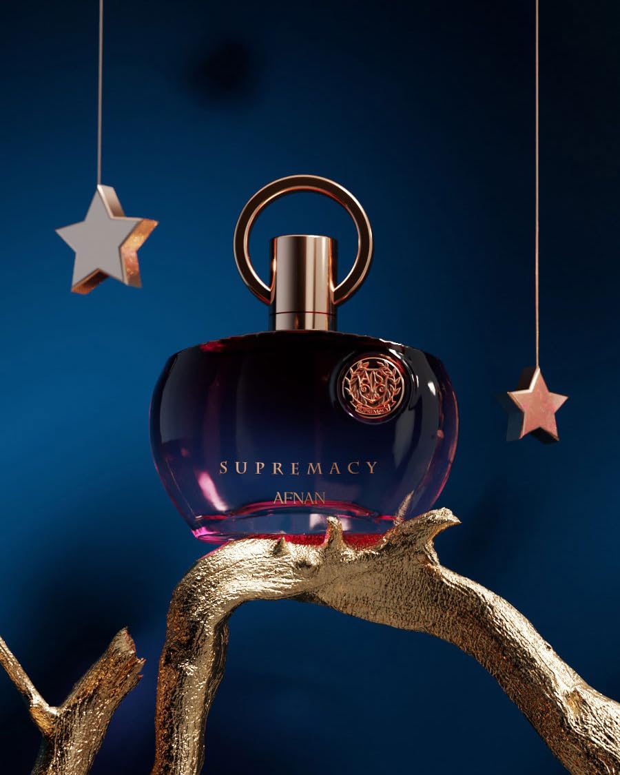 Afnan Supremacy Purple fragrance-juice close-up reveals amber and vanilla notes.