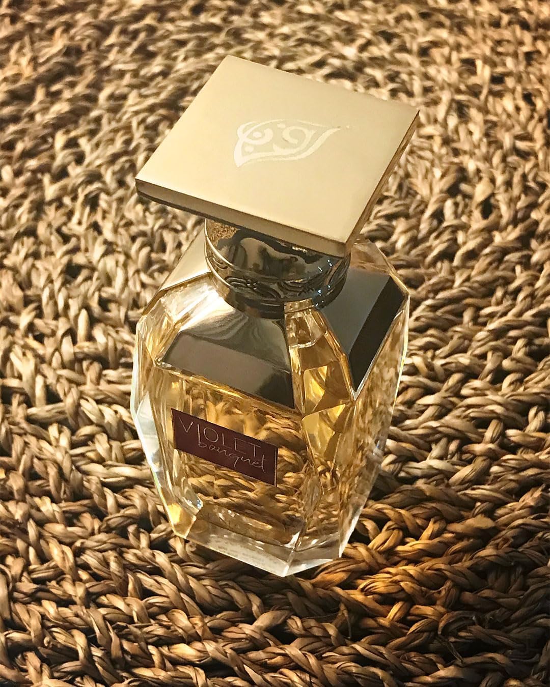 Afnan Violet Bouquet gift-wrap indicates luxurious presentation for celebrations.
