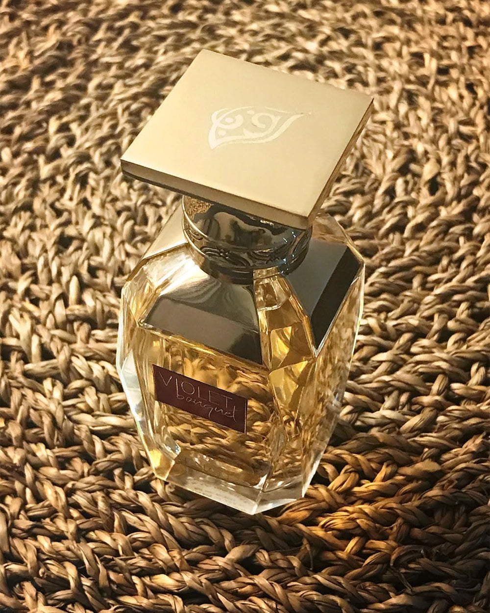 Afnan Violet Bouquet gift-wrap indicates luxurious presentation for celebrations.
