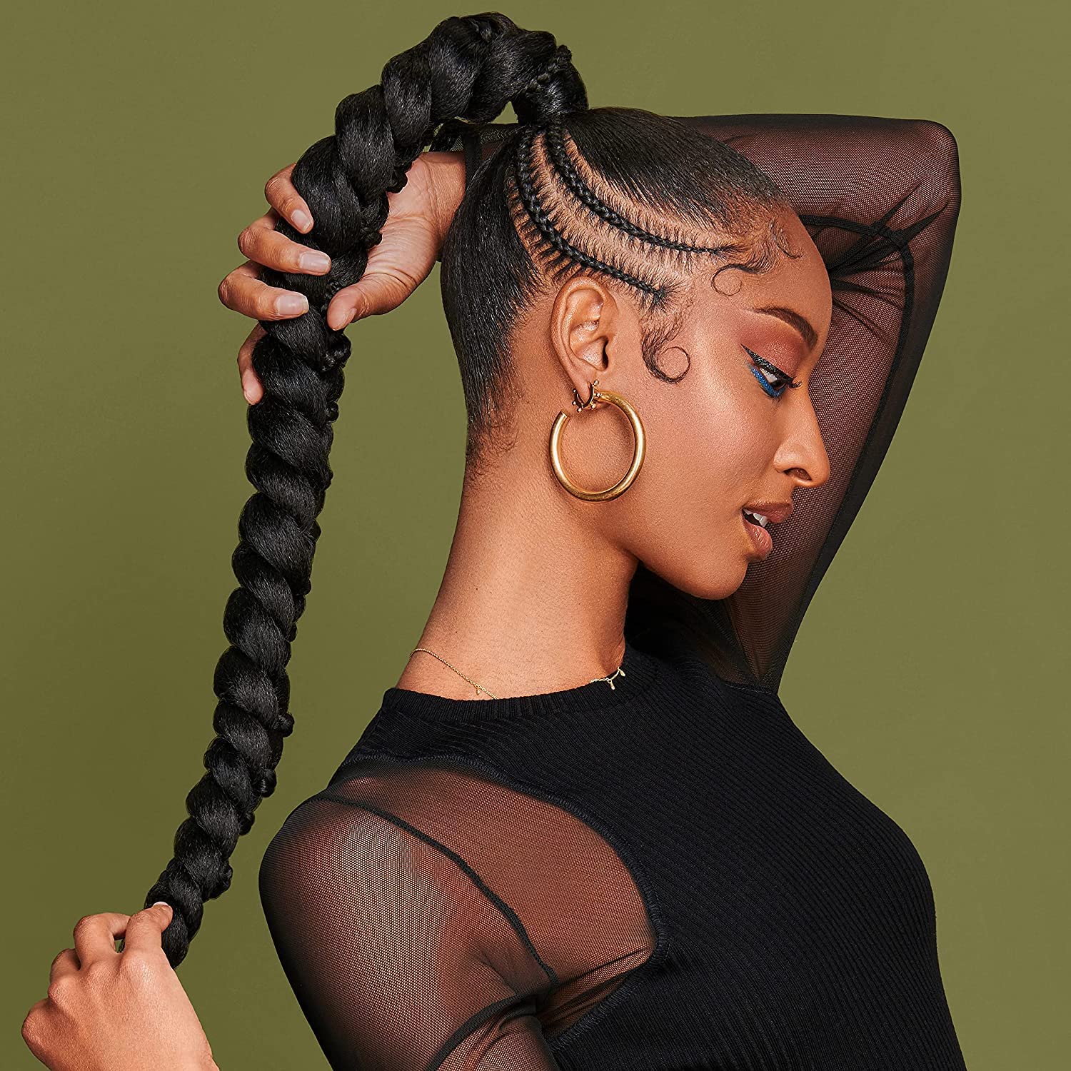 African Pride Olive Miracle 2-in-1 after-wash shiny hair look