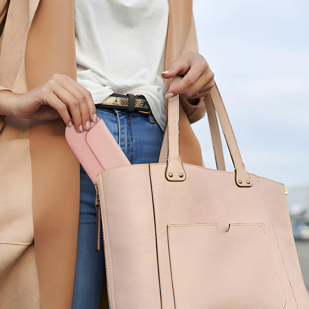 AGIKET portable travel necessity shown in a carry-on bag