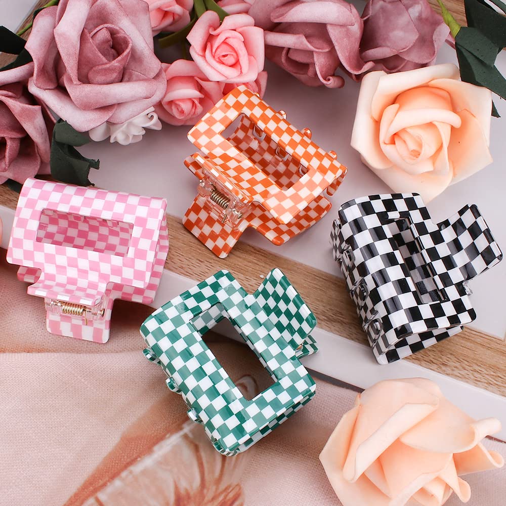 AHONEY checkered clip in hand shows portable 2in size for quick touch-ups on the go
