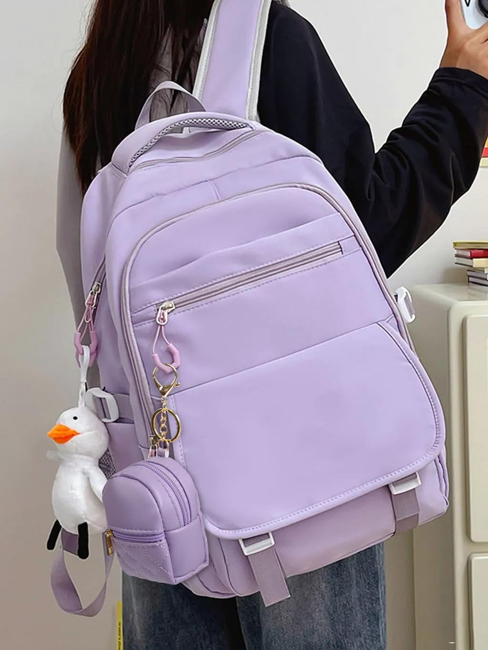 AIBFRID mini backpack keychain in beige, front view, pairs with outfits and keeps cards handy.