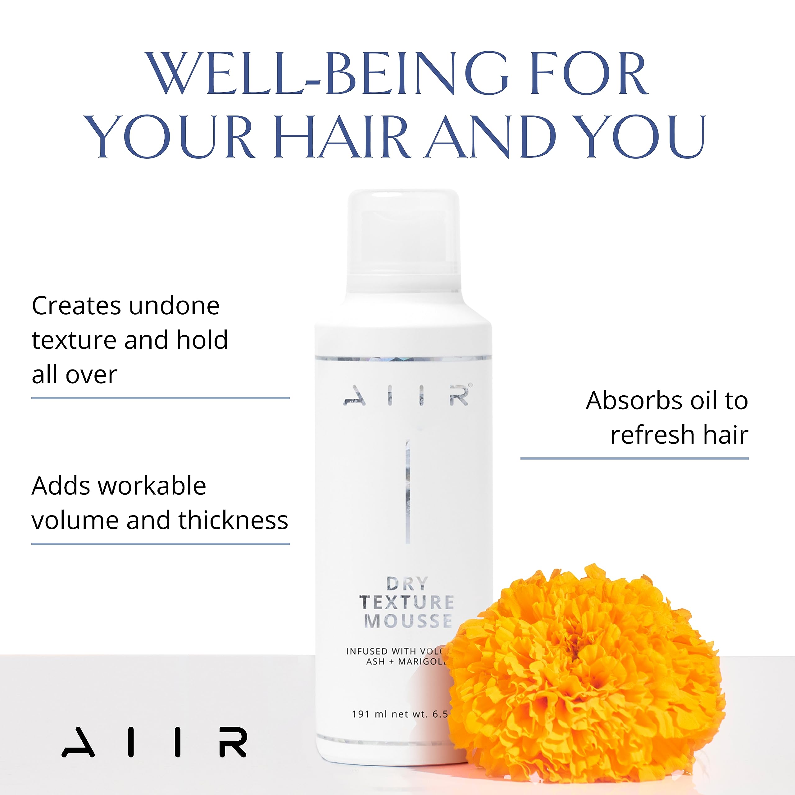 AIIR Dry Texture Mousse being applied for root lift and texture