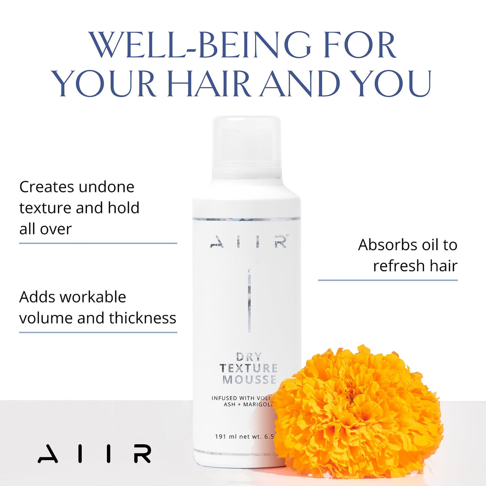 AIIR Dry Texture Mousse being applied for root lift and texture