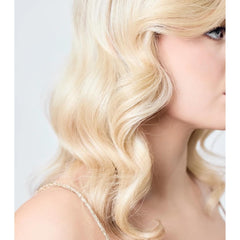 AIIR Shine Spray mist dispersion on hair for even shine and sleek texture.