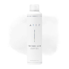 AIIR Texture Styling Spray bottle closeup highlighting lift and natural shine.
