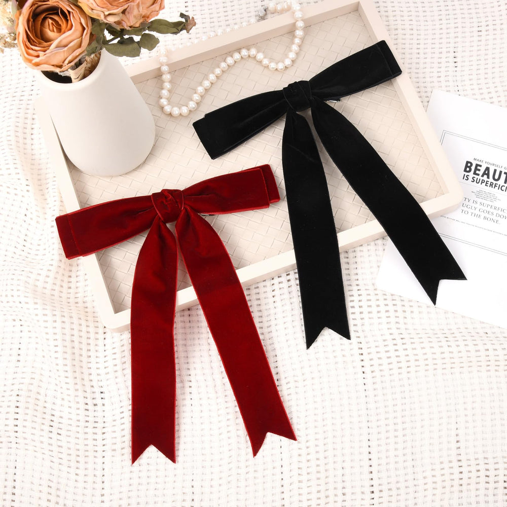 Aileam velvet bow packaging showing two bows in black and wine red