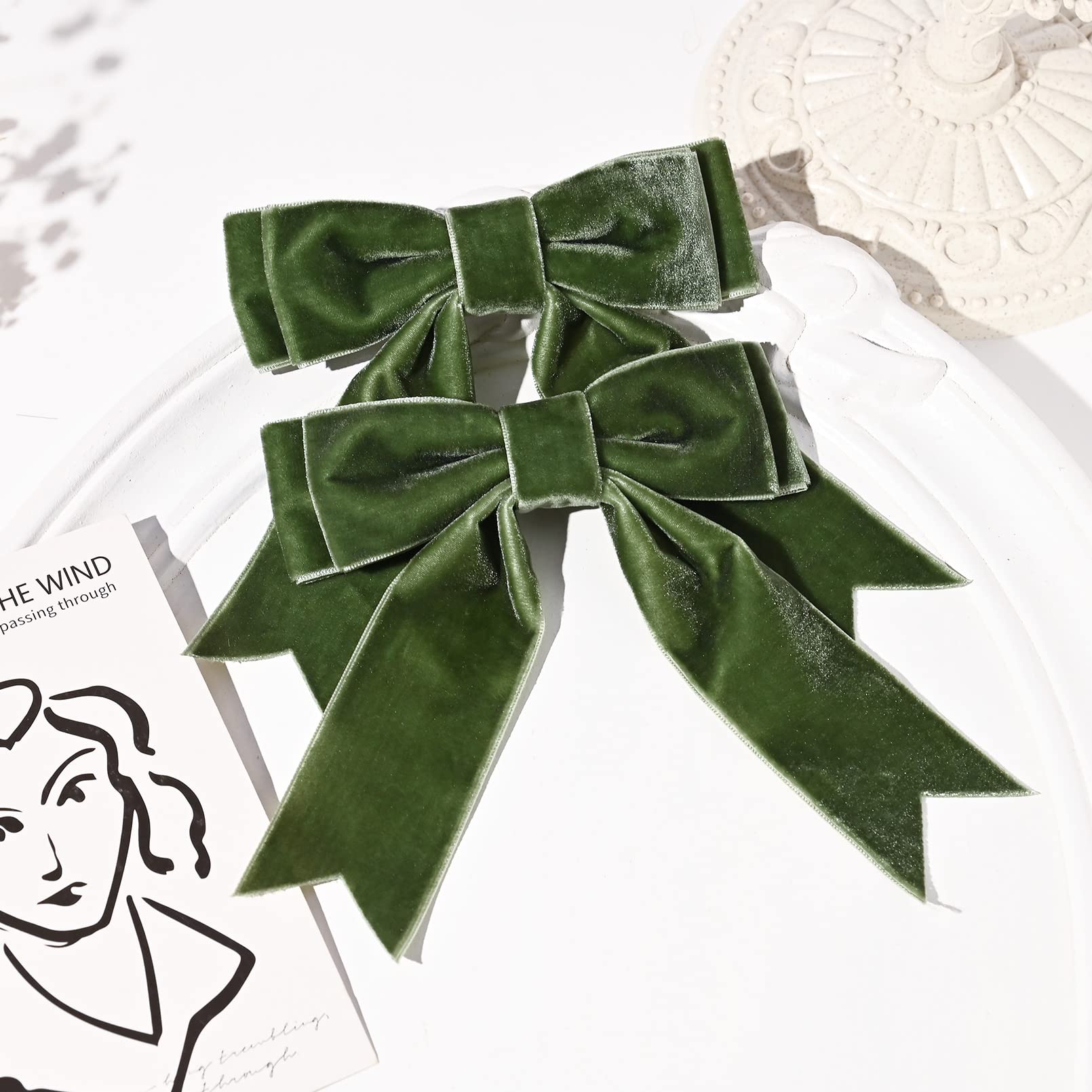 Aileam green velvet bow stitching detail highlighting durable construction.