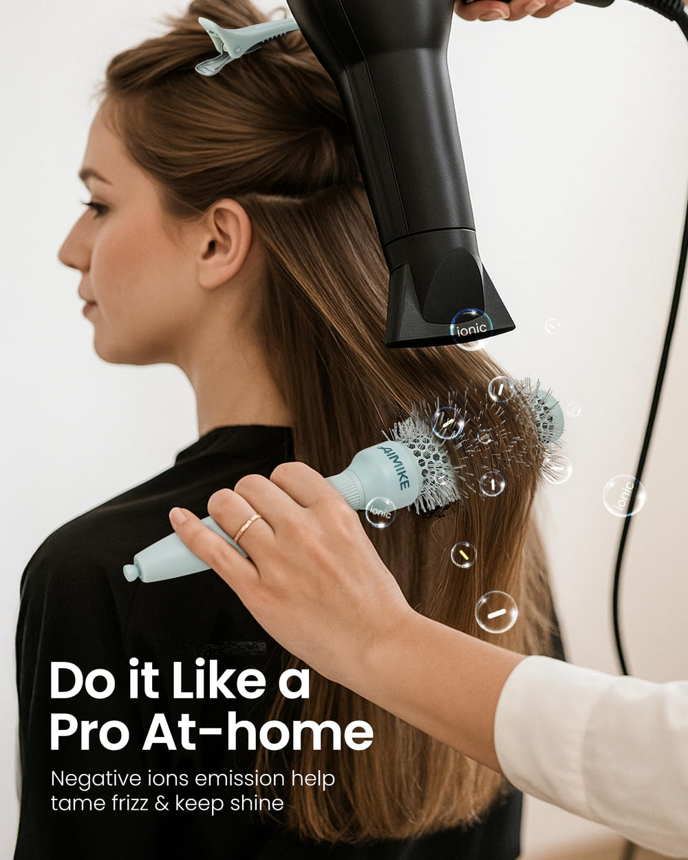AIMIKE NaturaVol ergonomic handle with built-in sectioning pin and hair clips.