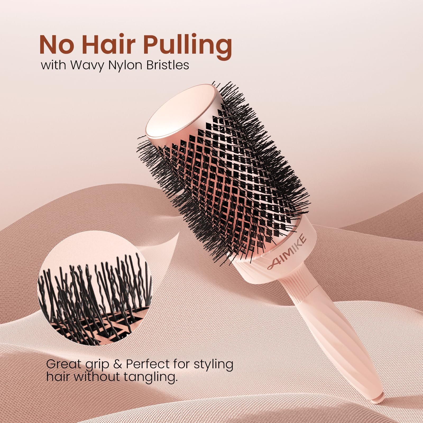 AIMIKE Rose Luxe Round Brush retractable pick assists sectioning and detangling.