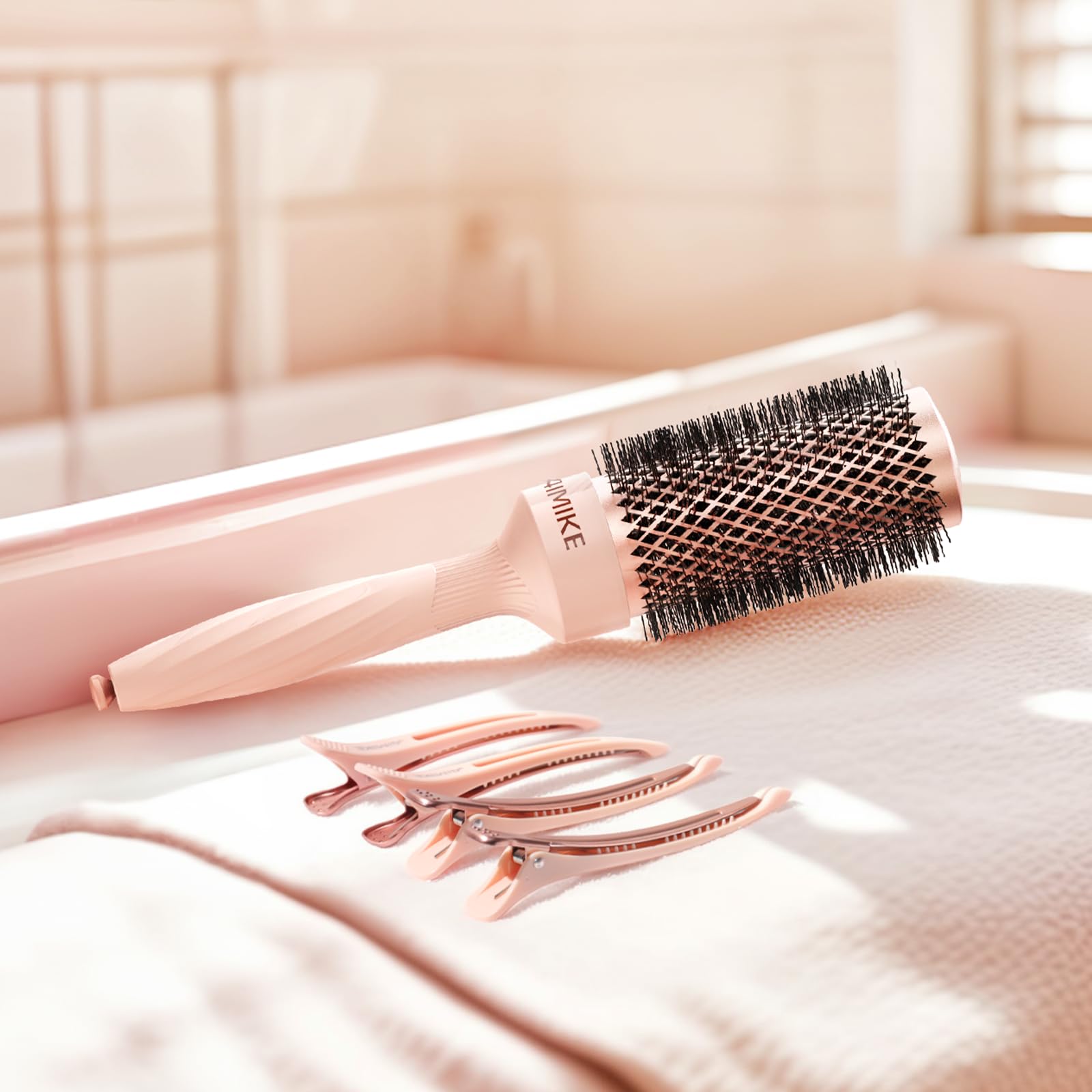 AIMIKE Rose Luxe Round Brush seamless construction prevents snagging during blowouts.
