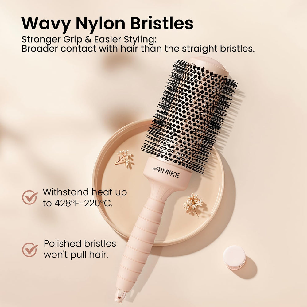 AIMIKE round brush in use during blowouts delivering volume and shine.