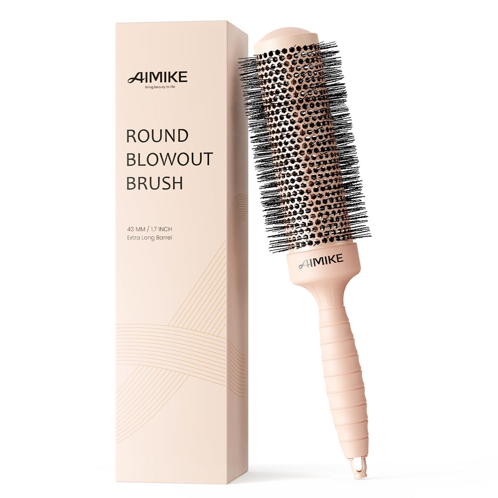 AIMIKE round brush with nano-silver-ion-infused tech delivers sleek, frizz-free blowouts.