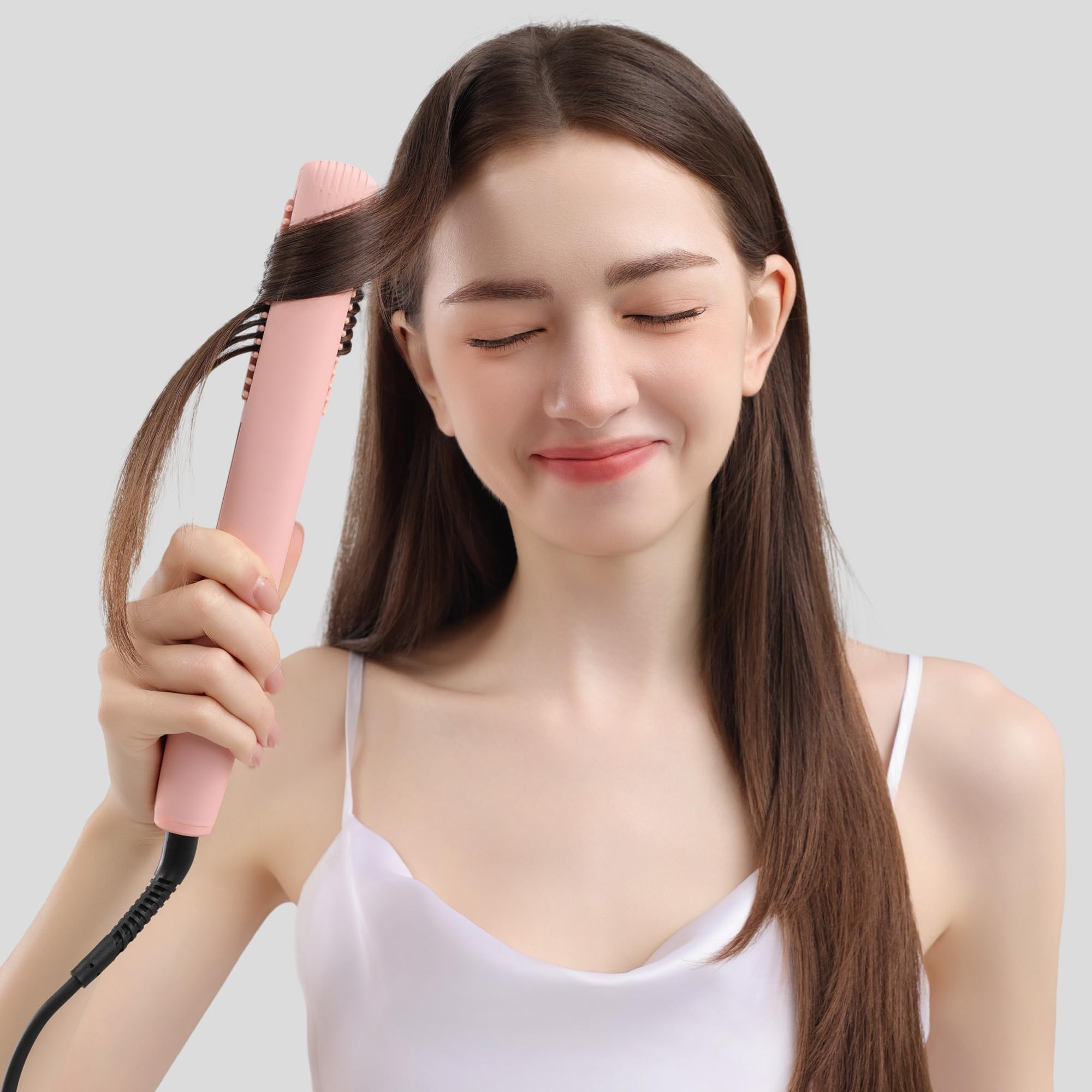 AINA straightener comb helps tame frizz and flyaways.