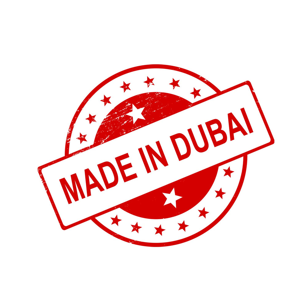 Ajmal Rain Drops Dubai-made mark underscores craftsmanship and fragrance heritage.