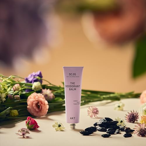 AKT Deodorant Balm in hand reveals creamy texture ready for absorption.