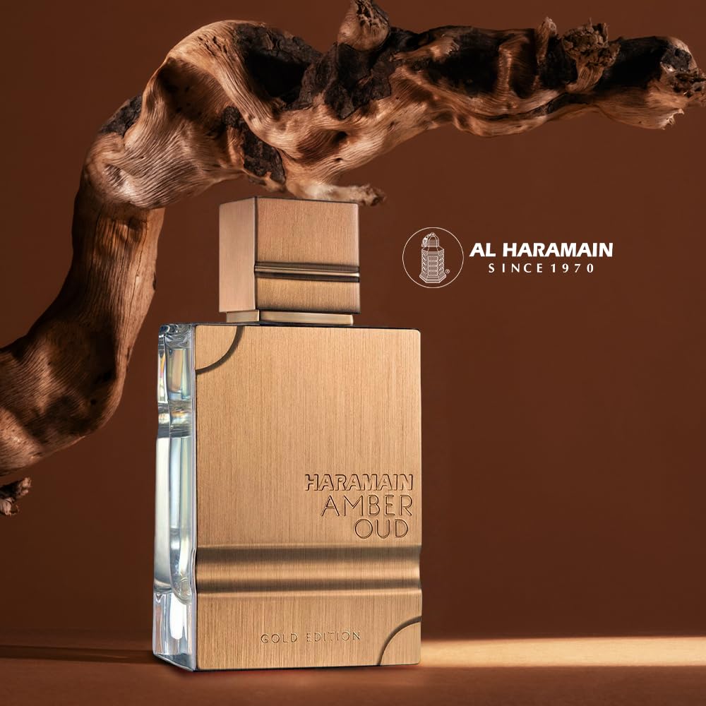Al Haramain Amber Oud Gold Edition juice in glass, rich amber hue hints at warmth.