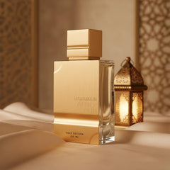 Al Haramain Amber Oud Gold Edition spray top in action suggests a refreshing start