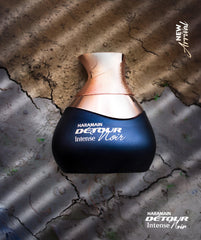 Al Haramain Detour Noir Exclusif label close-up emphasizes brand story and premium quality.