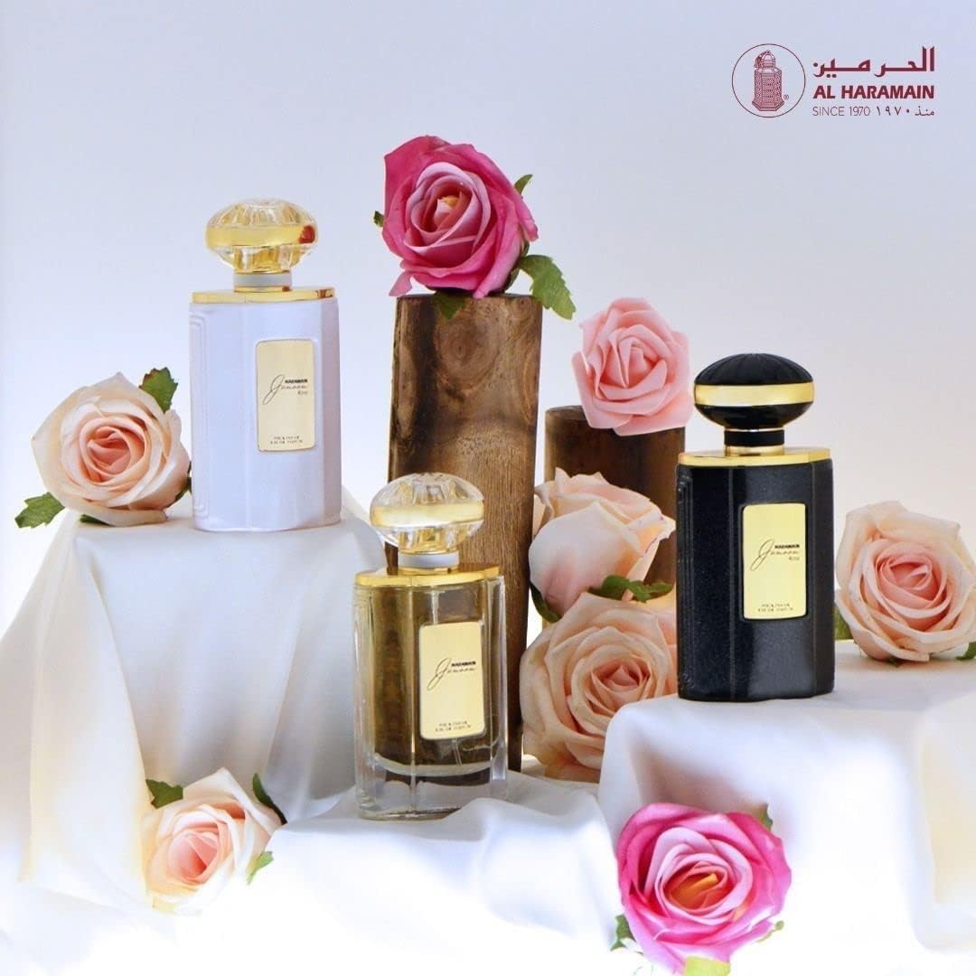 Al Haramain Junoon Noir bottle with spritz hints at fragrance experience.