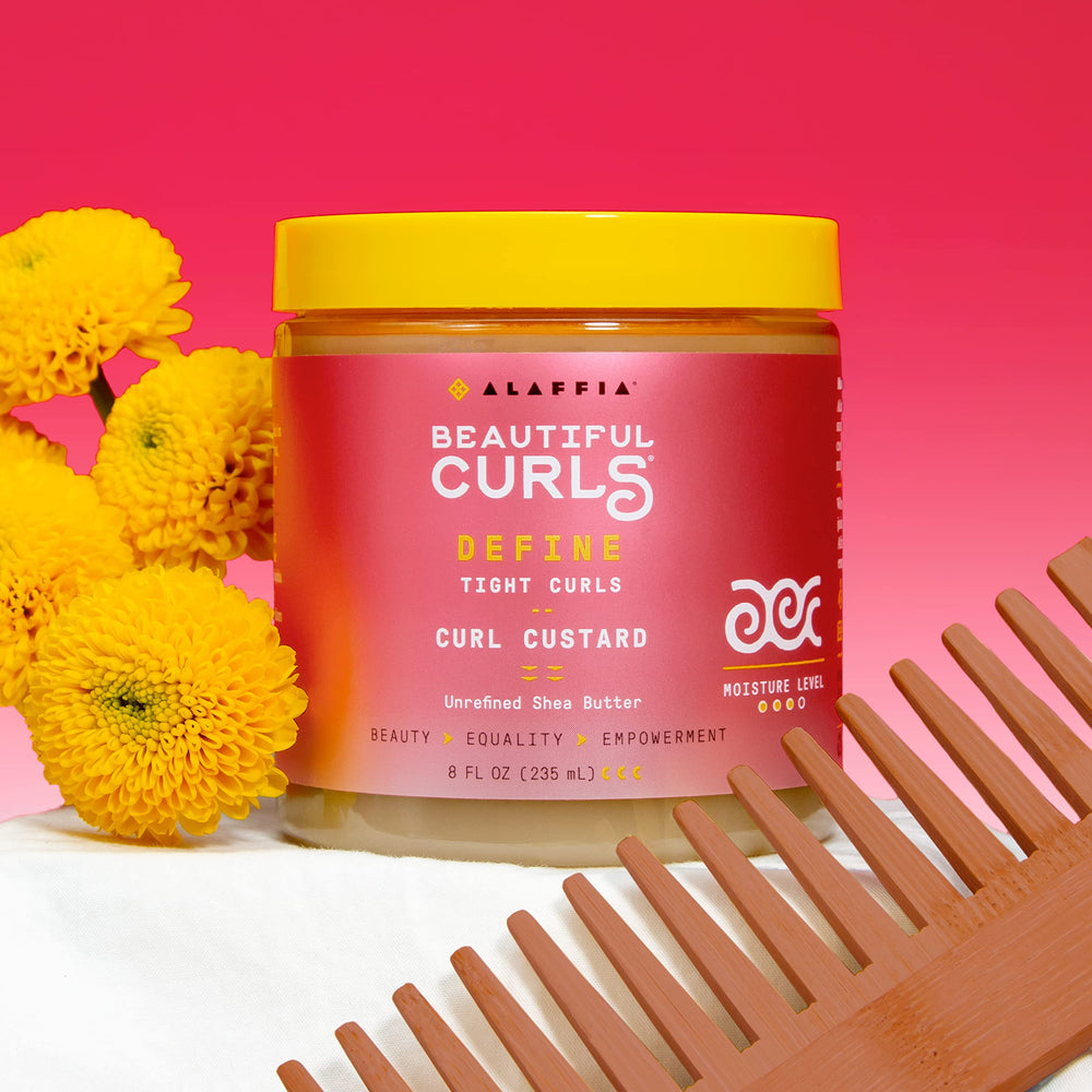 Elongated curls using Alaaffia Beautiful Curls curl custard on defined strands