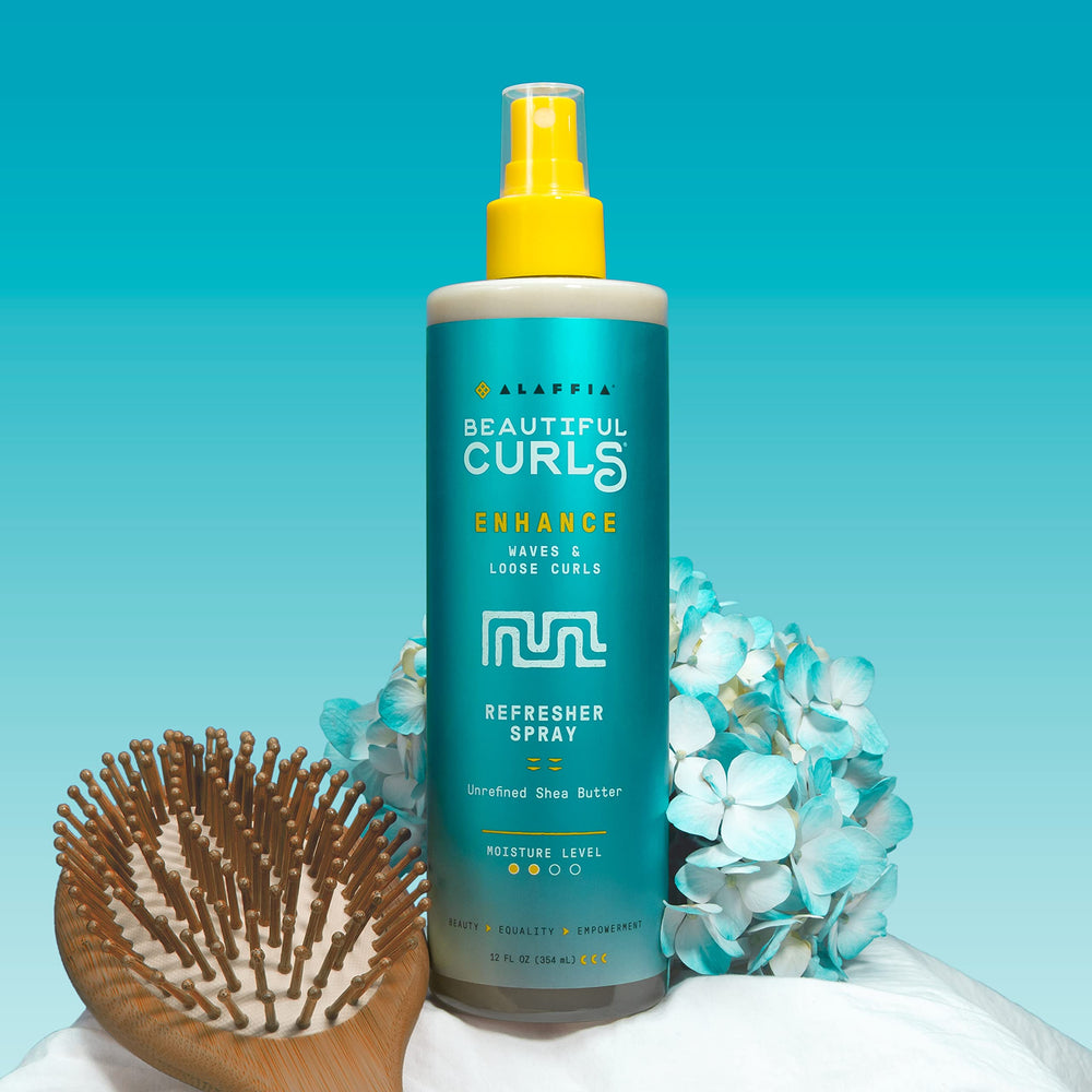 Alaffia Beautiful Curls moisture boost image suggests soft shine and healthier feel