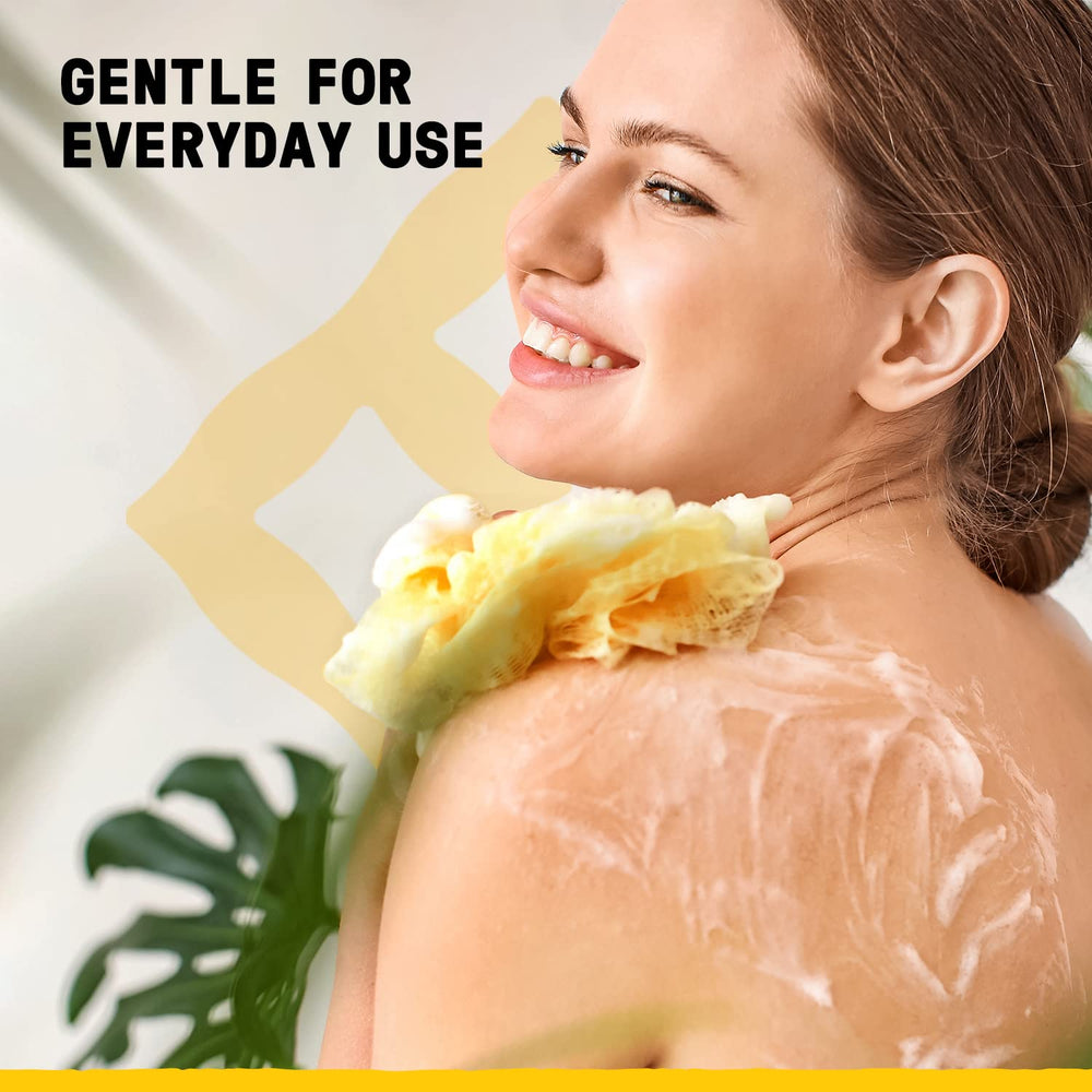 Alaffia Everyday Coconut body wash in a shower scene suggests an easy daily ritual.