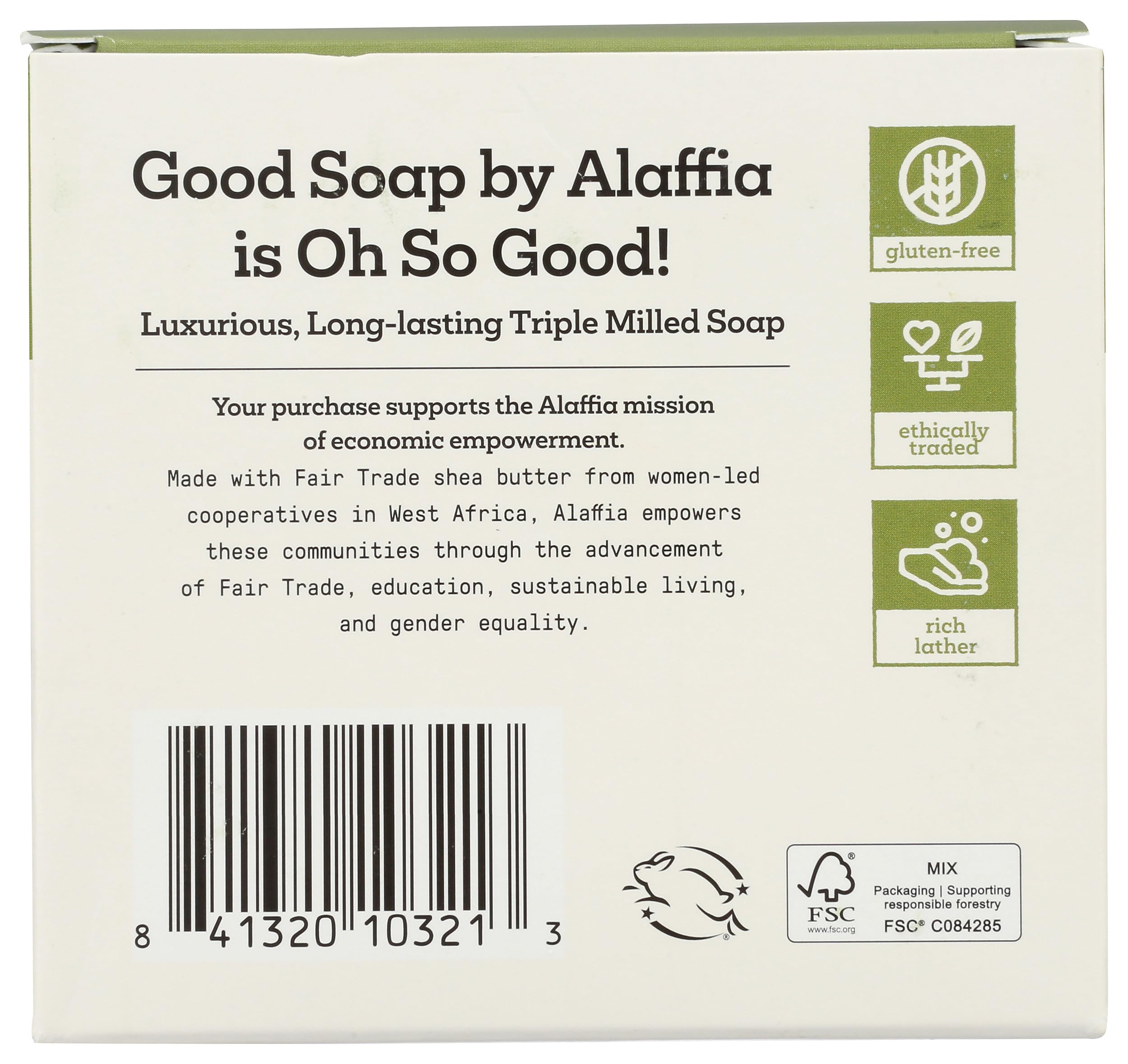 A closeup of an Alaffia Peppermint Good Soap bar reveals creamy texture and lather.