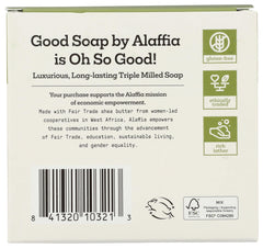 A closeup of an Alaffia Peppermint Good Soap bar reveals creamy texture and lather.