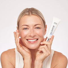 ALASTIN Ultra Light moisturizer on cheek demonstrates fast-absorbing daily hydration.