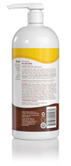 Alba Botanica More Moisture Coconut Milk conditioner being applied to hair for hydration