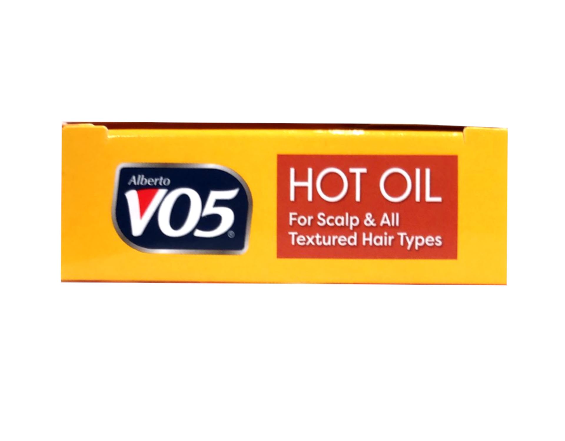 Alberto VO5 Hot Oil Therapy hands applying one-minute treatment