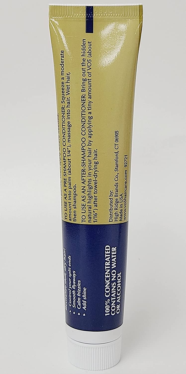 Alberto VO5 Conditioning Hairdressing on color-treated strand shows vibrancy.