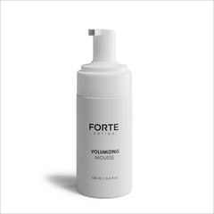 Alex Costa Forte Series volumizing mousse applied for lasting style and movement.